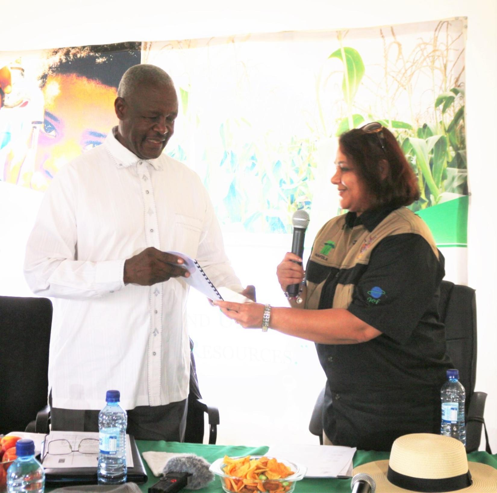 The UNDP Namibia Resident Representative, Ms. Alka Bhatia hands over the NAFOLA project to the Minister of Agriculture Water and Forestry