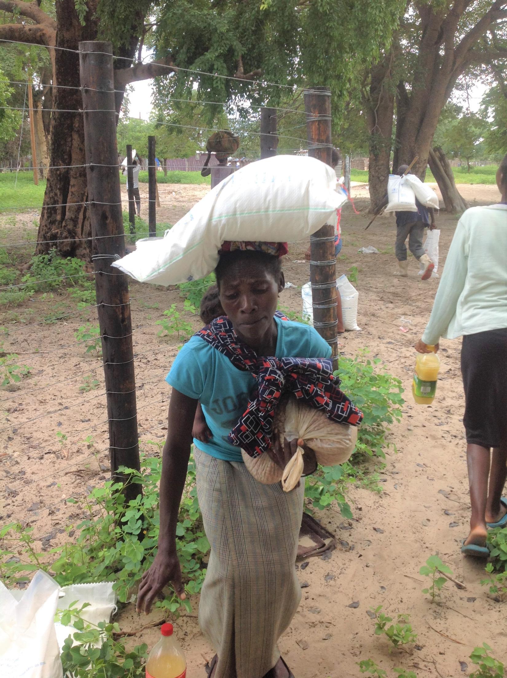 Izabel receives food to support her family 