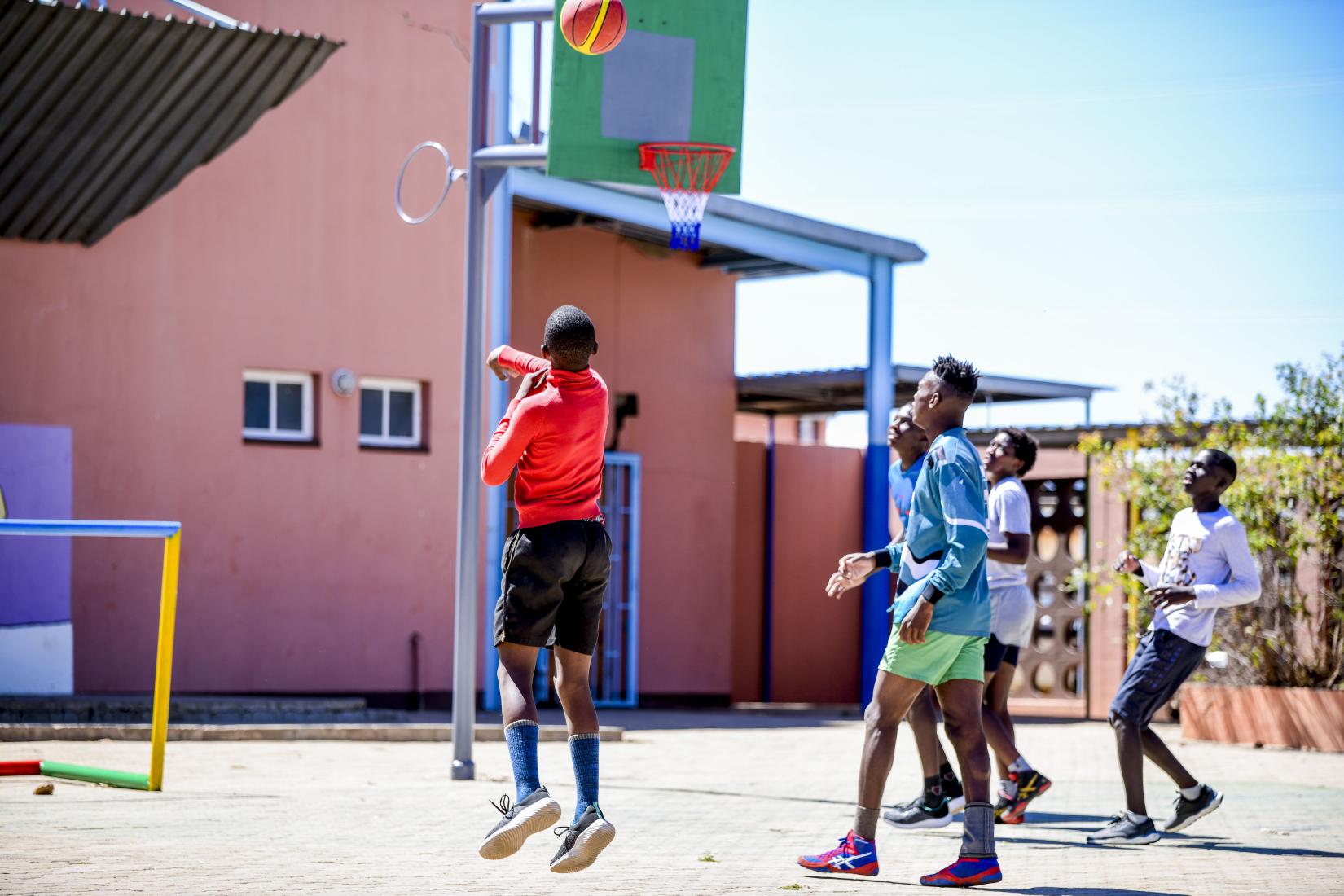 Children from the Katutura After-care centre show off some of their skills on the basketball court.