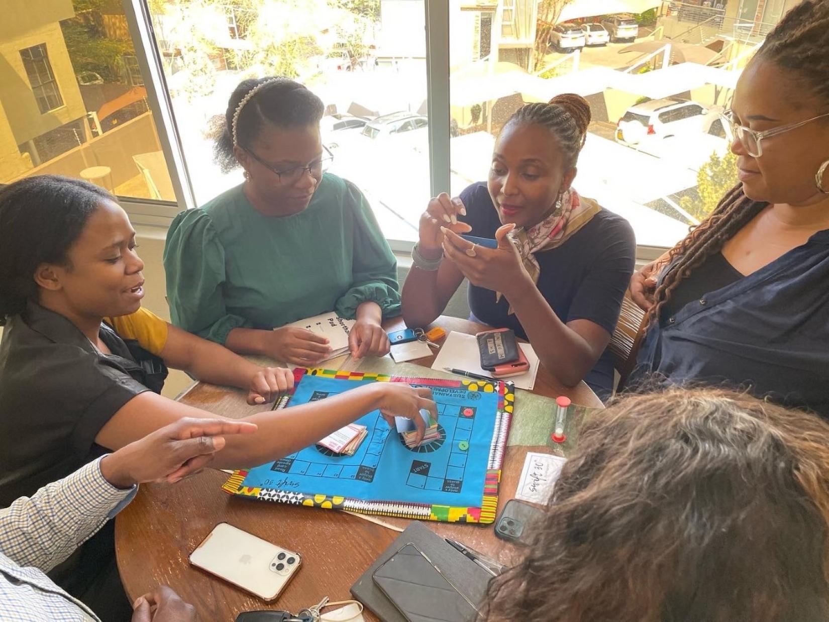 The board game provides a meaningful way to learn about the SDGs. NamibRe staff were fully engaged to the fun learning.