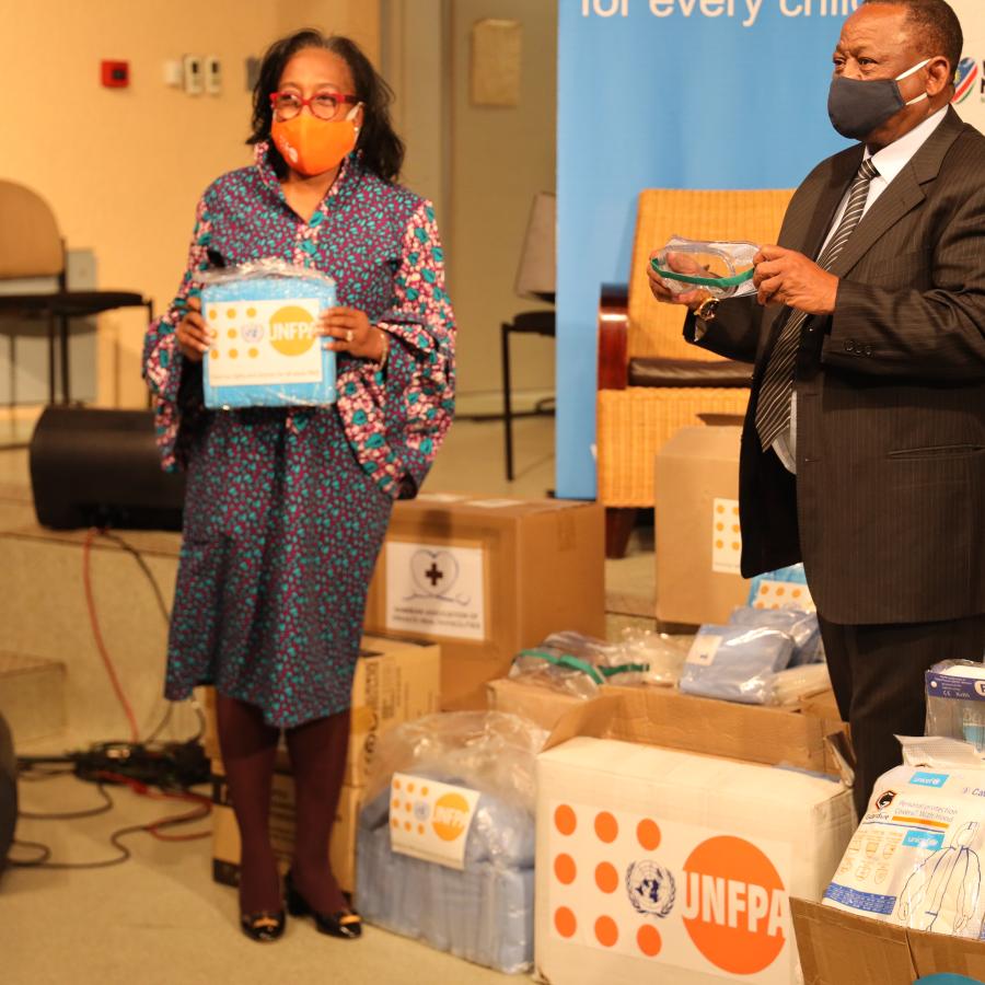 Dennia Gayle, UNFPA Representative pictured with Dr. Kalumbi Shangula during the handover