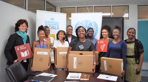 The Group of Namibian girls pictured with the UN Resident Coordinator a.i. and Ms. Edda Bohn from the Ministry of Education, Arts and Culture.