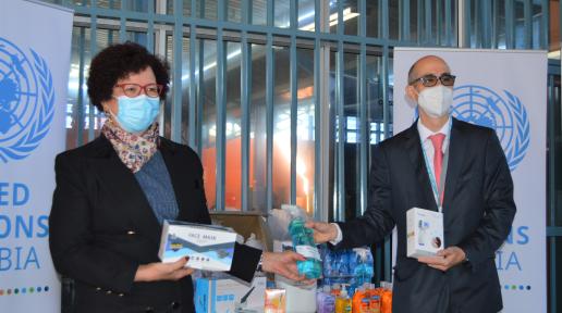 Left: Ms. Petronella Masabane, Deputy Director, MOHSS receives UN Namibia donation from Mr. Carlos Fernandez, Strategic Planning and Team Leader, RCO Office, on behalf oF UN Namibia