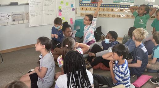 Third graders attentive to the discussion on how the UN system works